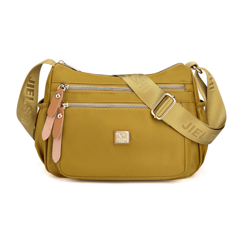 Multi-compartment shoulder bag